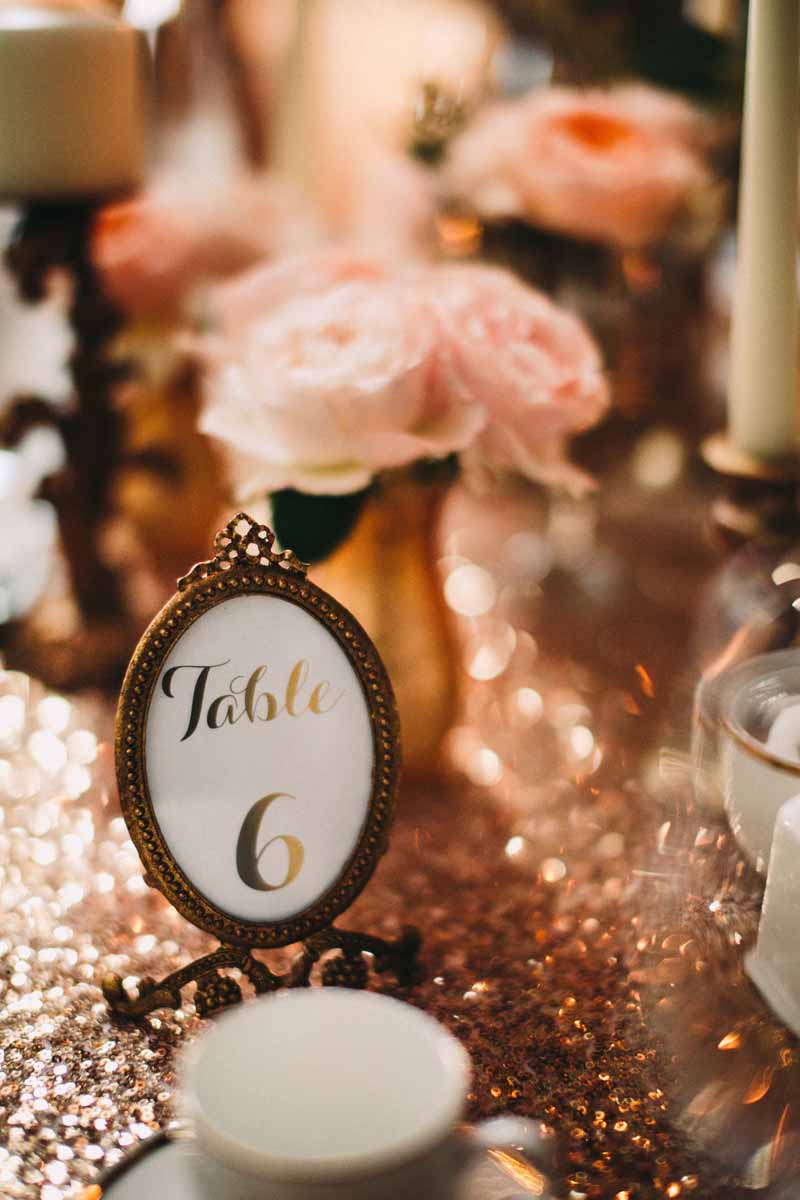 table-numbers-in-small-gold-frames-knowsley-hall-passion-for-flowers-kmorganflowers