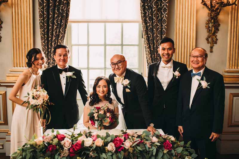 wedding-ceremony-table-flowers-luxe-floral-gardlands-deep-pink-blush-pink-peach-roses-at-knowsley-hall-by-passion-for-flowers-1