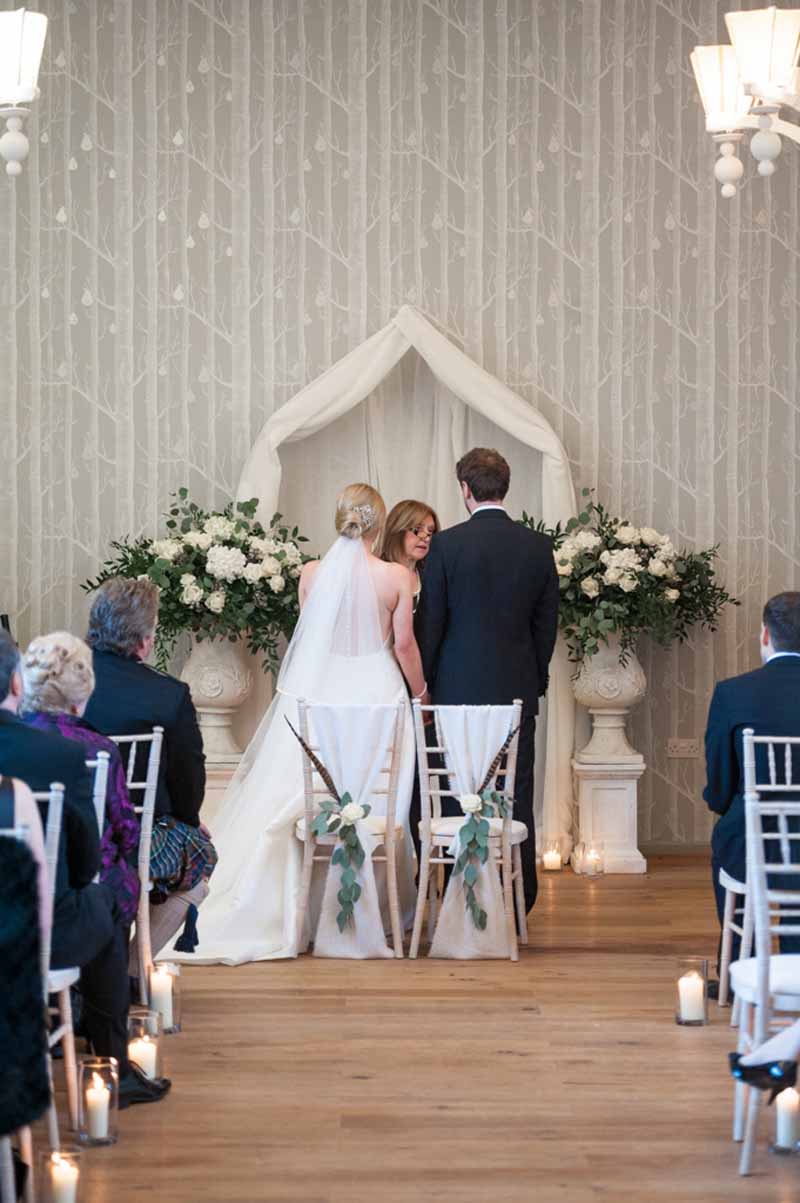 Hampton Manor wedding ceremony styling lanterns down aisle rustic trees backdrop Passion for Flowers 