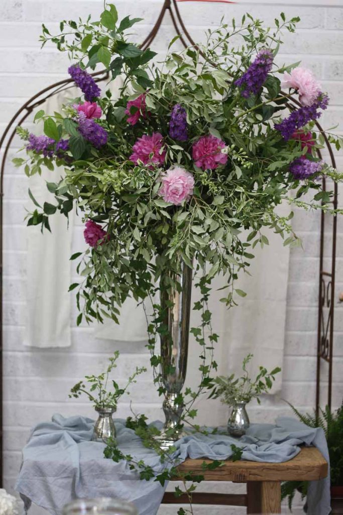 Tall Silver Vase Wedding Centrepieces with natural flowers pink purple blue learn how to make one at Passion for Flowers 1-2-1 flower school (1)
