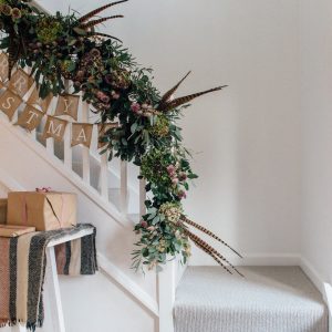 christmas staircase garland of flowers Passion for Flowers The White Company Joules