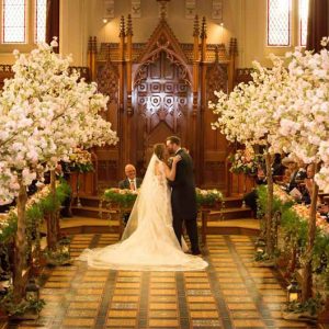 Epic wedding ceremony decorations trees metres of flowers length of the church Stanbrook Abbey wedding by Passion for Flowers 2