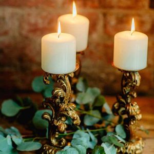 Gold ornate candle sticks for hire Passion for Flowers Shustoke Farm Barns