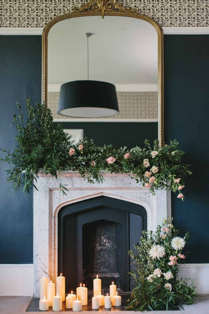 Fireplace decoration flowers and candles Passion for Flowers