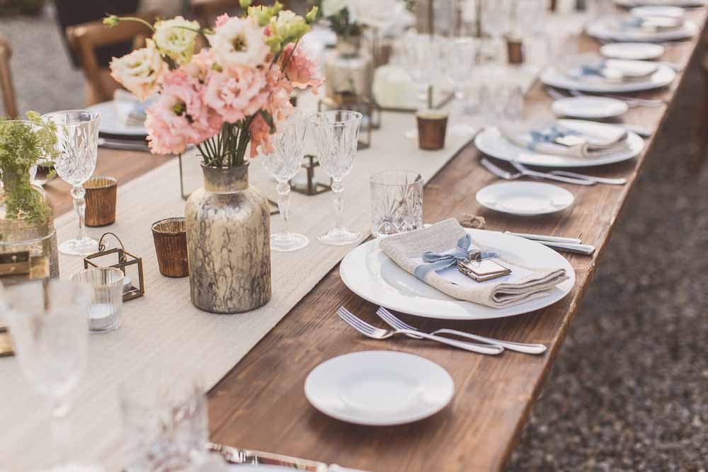Rustic Hilltop Italian Wedding, Long wooden wedding guest tables outside Tuscany - Florals by Passion for Flowers, Lanterns & Decor The Wedding of my Dreams Venue Locanda In Tuscany