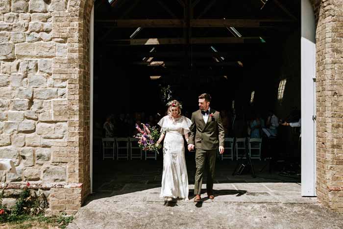 Summer Longbourne Barn wedding ceremony followed by Tipi Wedding Florist - Passion for Flowers