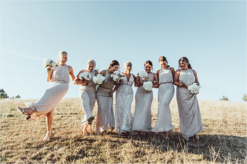 White hydrangea bouquets bridesmaids summer barn wedding
