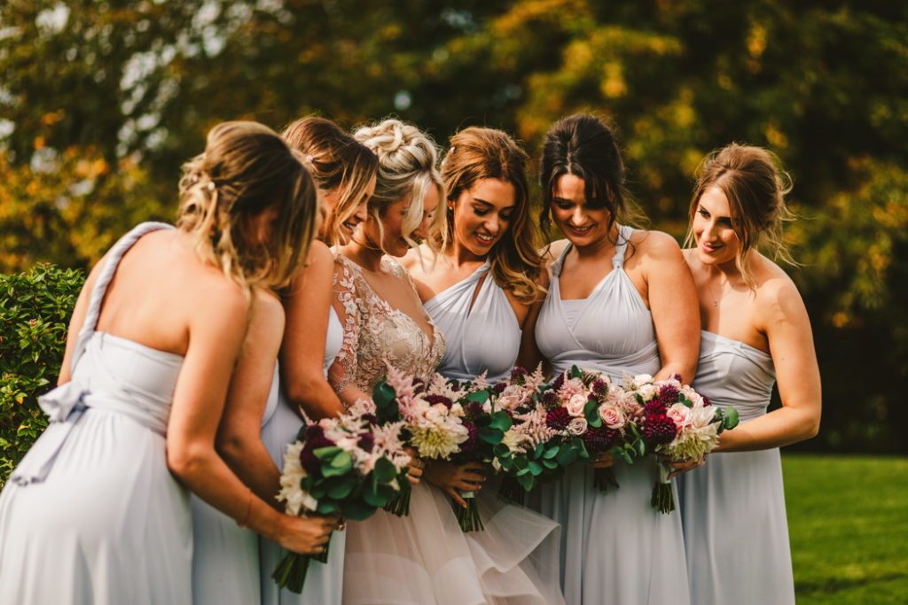 Deep burgundy blush pink flowers bridesmaids bouquets