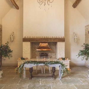 Rustic Barn wedding ceremony fireplace Blackwell Grange wedding florist Passion for Flowers