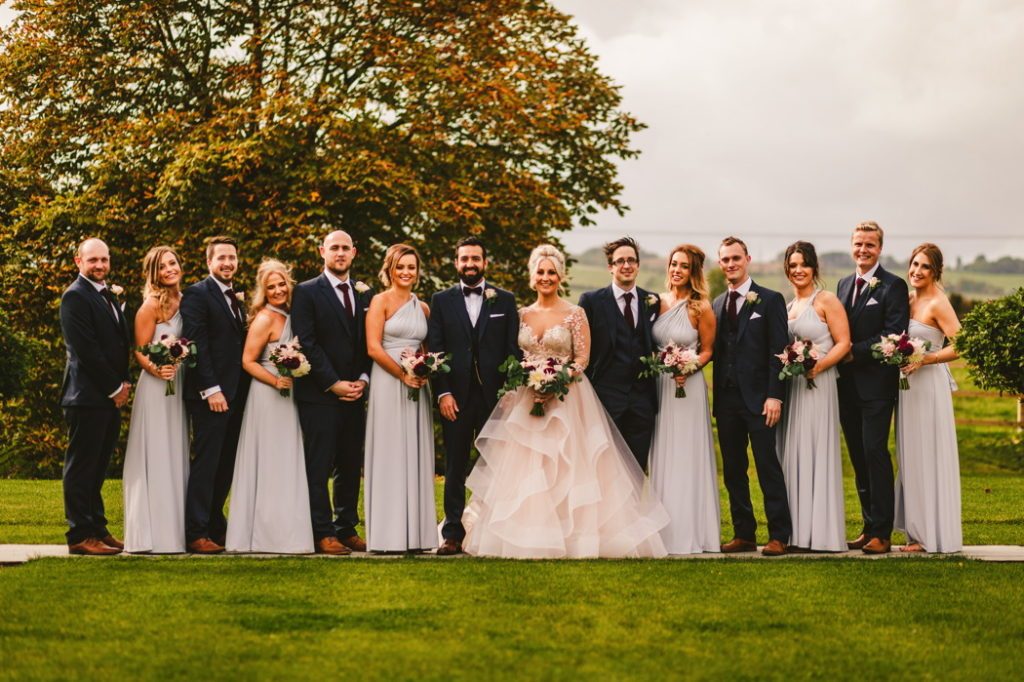 soft grey lilac bridesmaids navy groomsmen suits wedding