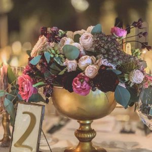 Gold footed bowl wedding centrepiece with brass table numbers autumn flowers Passion for Flowers Hampton Manor florist