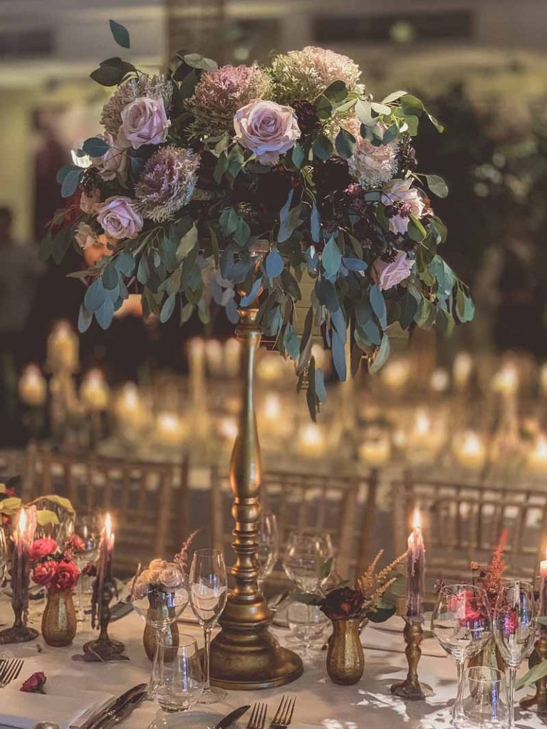 Tall autumn wedding centrepiece with brass and gold autumn flowers Passion for Flowers Hampton Manor florist