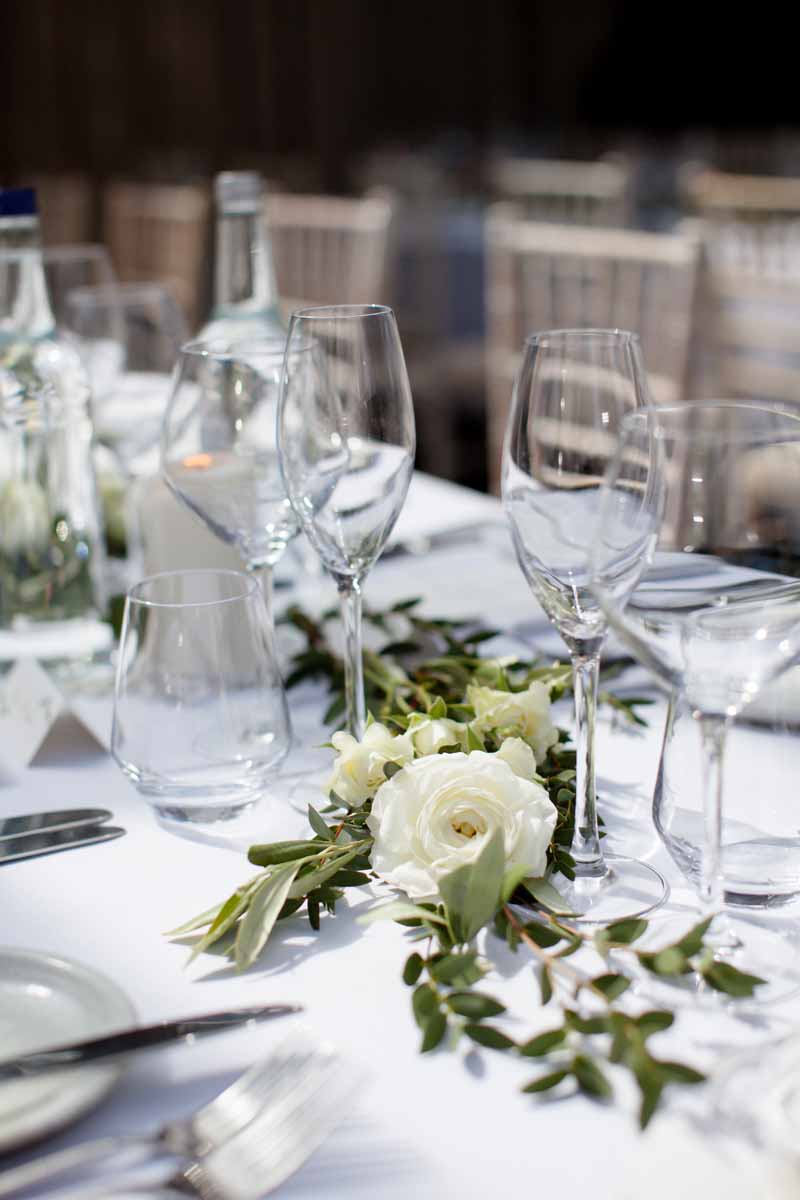 Do everything with my power love at home Long wedding tables garlands white green flowers Passion for Flowers at  Hampton Manor - Passion for Flowers