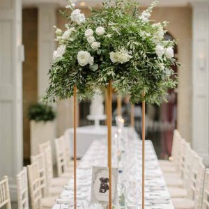 Tall copper floral stands centrepieces Hampton Manor florist