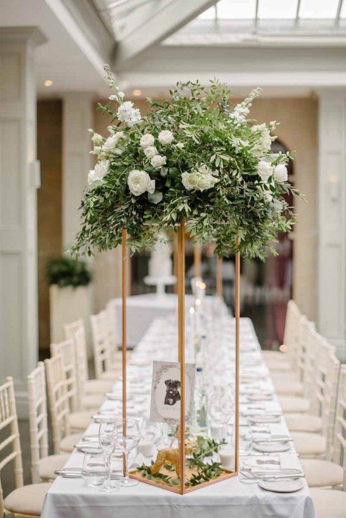 Tall copper floral stands centrepieces Hampton Manor florist