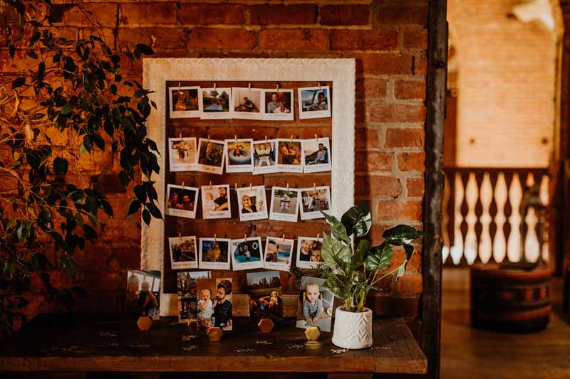 Wedding photo displays peg board frames Shustoke Barn wedding