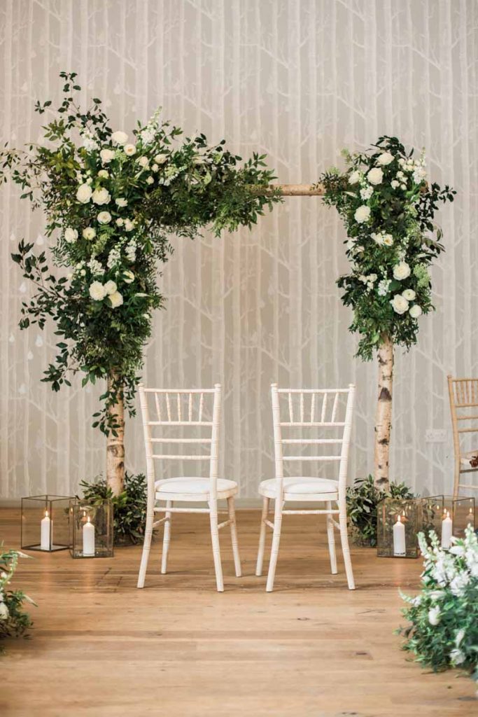 Wild white green wedding ceremony arches Hampton Manor