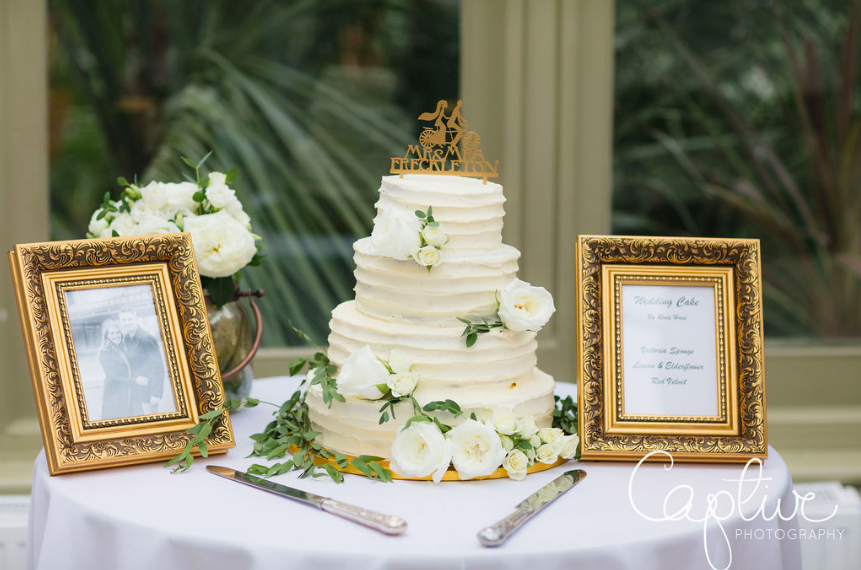 White wedding cake with white roses elegant