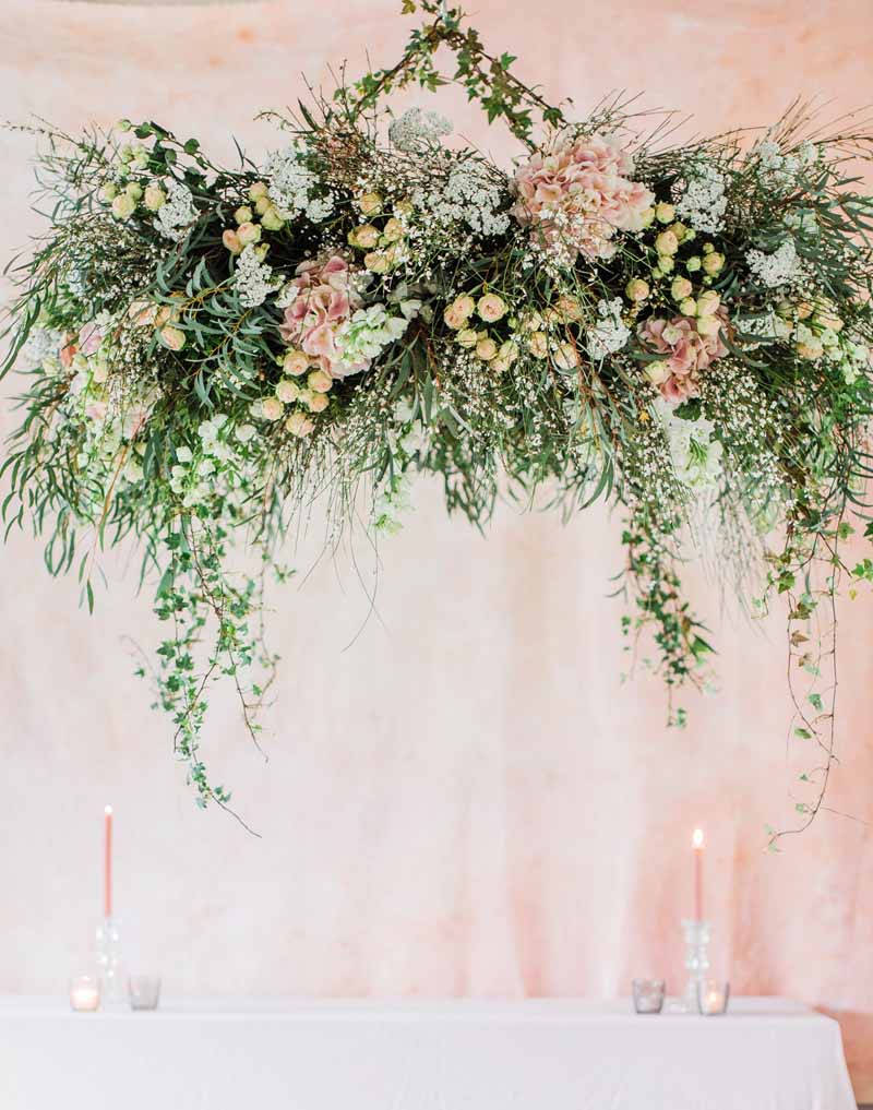 hanging floral ring wedding flowers chandelier