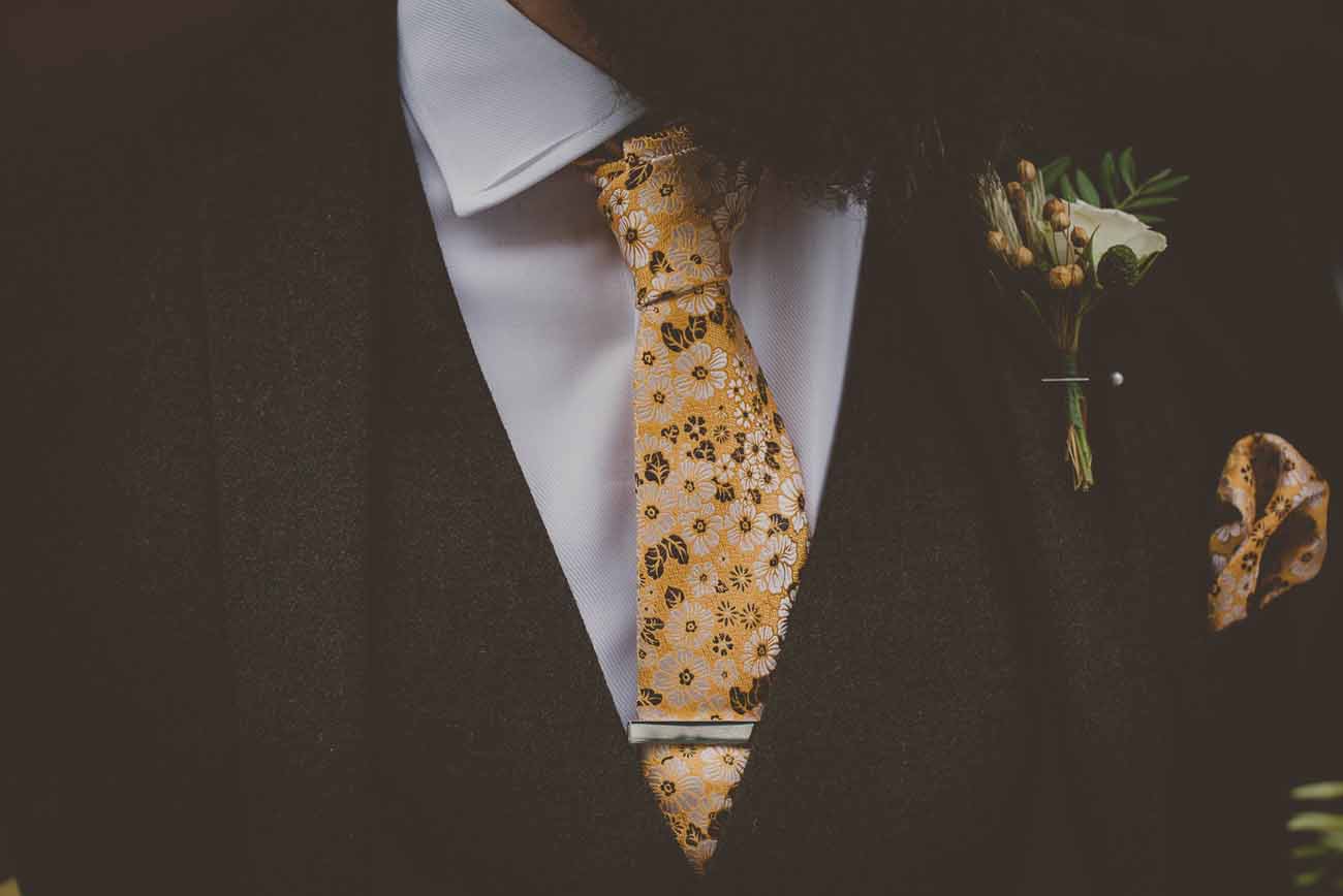 yellow tie wedding button holes
